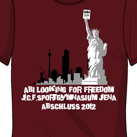 Rotbraunes T-Shirt mit Freiheitsstatue und Stadt-Silhouette, Text "ABI LOOKING FOR FREEDOM J.C.F. SPORTGYMNASIUM JENA ABSCHLUSS 2012".