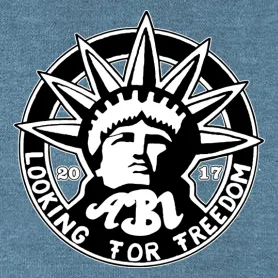 Schwarzes Logo auf blauem Hintergrund mit der Statue of Liberty, umgeben von Sternen und dem Text "LOOKING FOR FREEDOM ABI 2017".