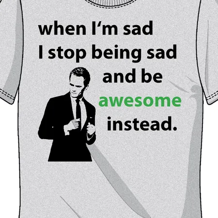 Graues T-Shirt mit Aufdruck eines Mannes in Anzug und einem inspirierenden Spruch in Englisch.