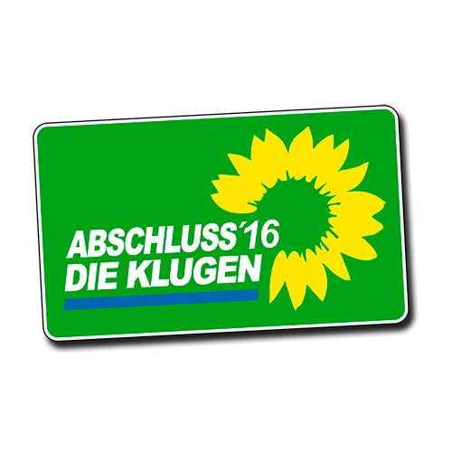 Grünes Schild mit gelber Sonnenblume und Text "Abschluss '16 Die Klugen" auf gelbem Hintergrund.
